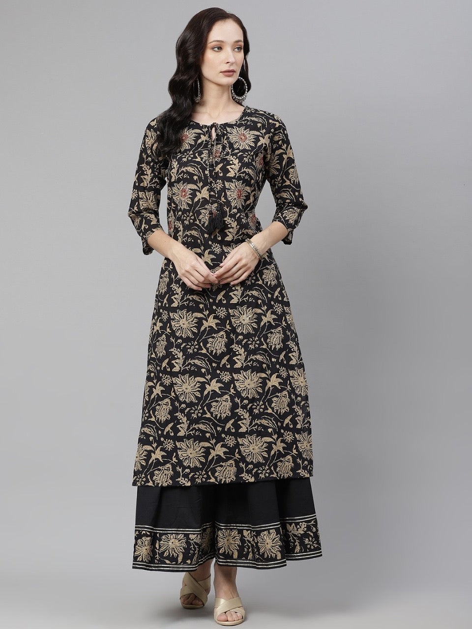 Black and beige printed Kurta with Palazzos
Ethnic motifs printed, Straight shape